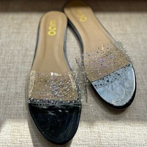 Black slip on sandal with multi color rhinestone. Size 8